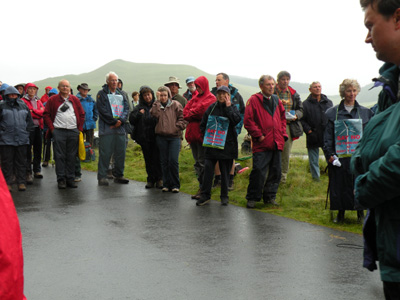 Assembling
                in the rain